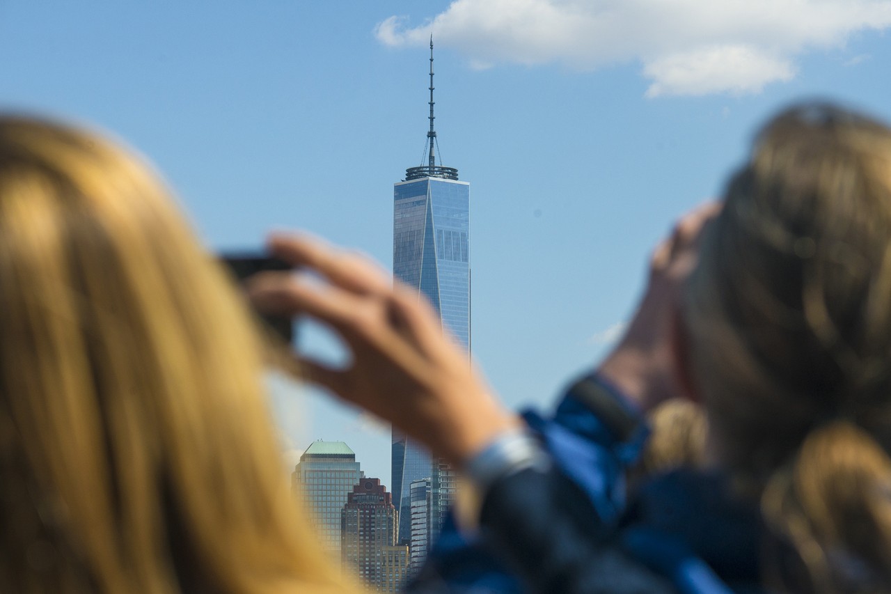 Patrons take pictures of One World Trade Center in New York City
